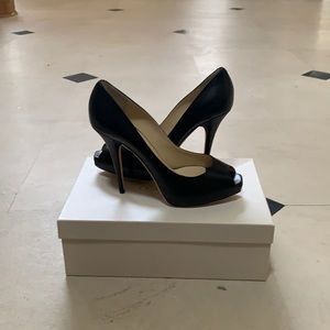 Never worn jimmy choos size 10.5